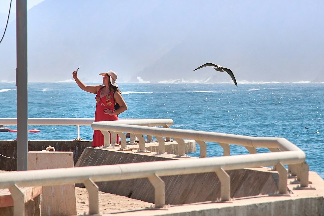 Portrait of a young Latin American woman photographer